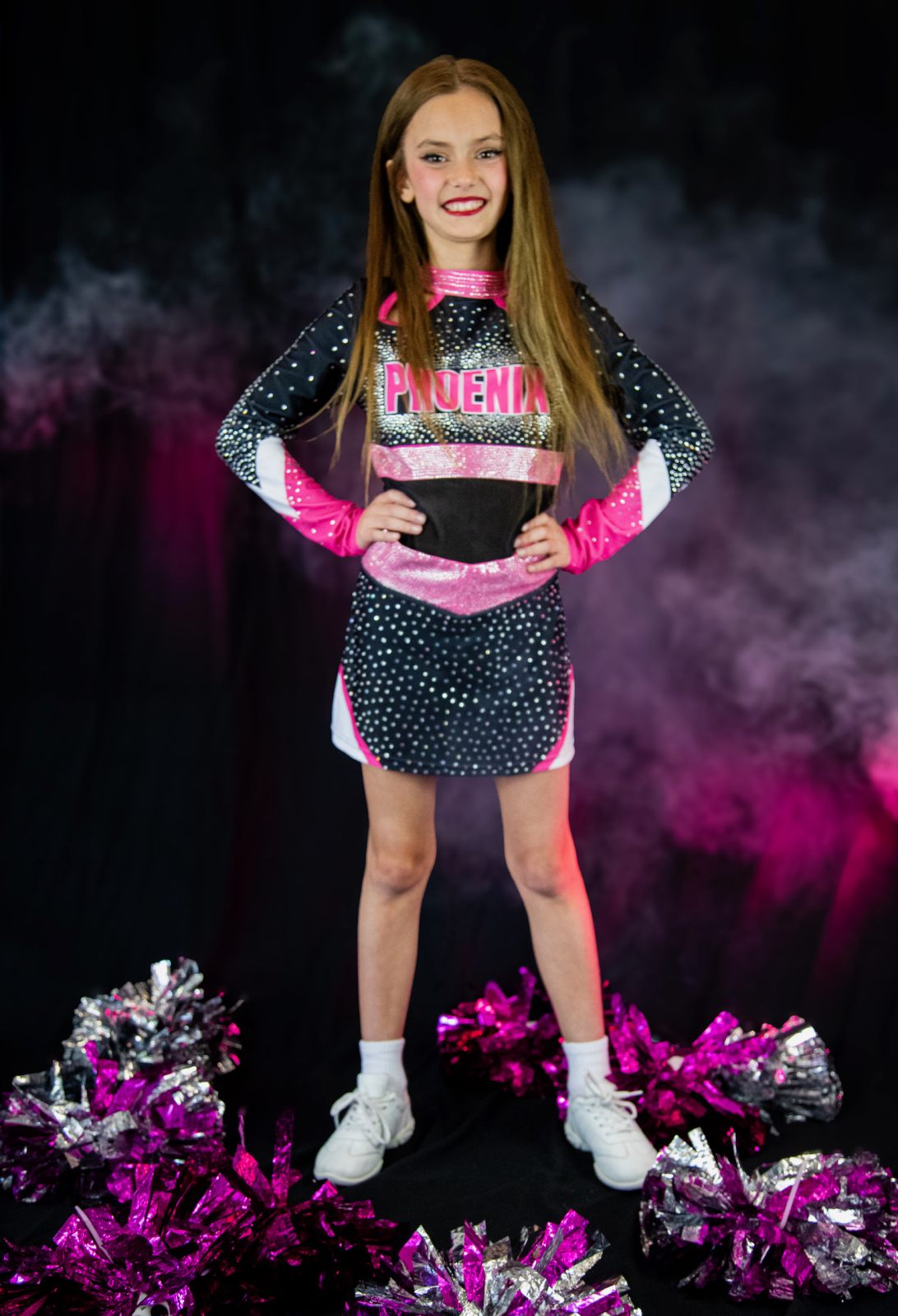 Phoenix all-star cheer athlete with pom-poms